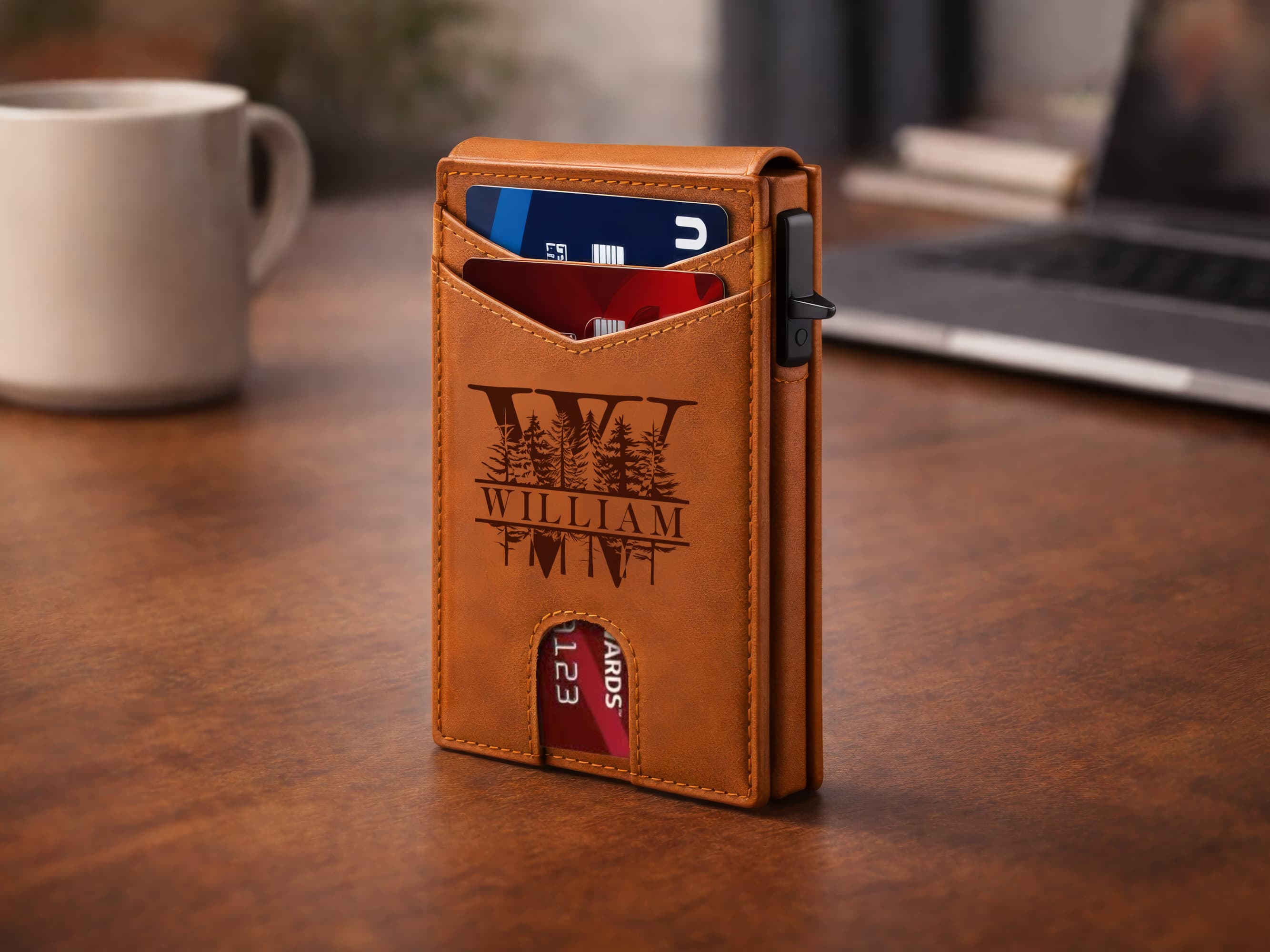 Brown leather wallet with card slots on a wooden surface with a cup and laptop in the background
