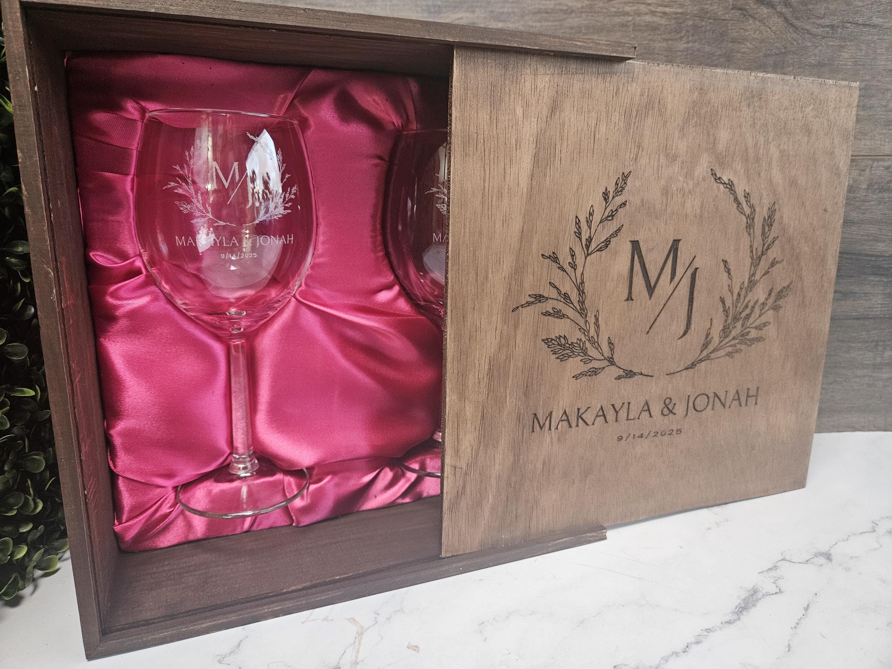 a wine glass and a wine glass in a box