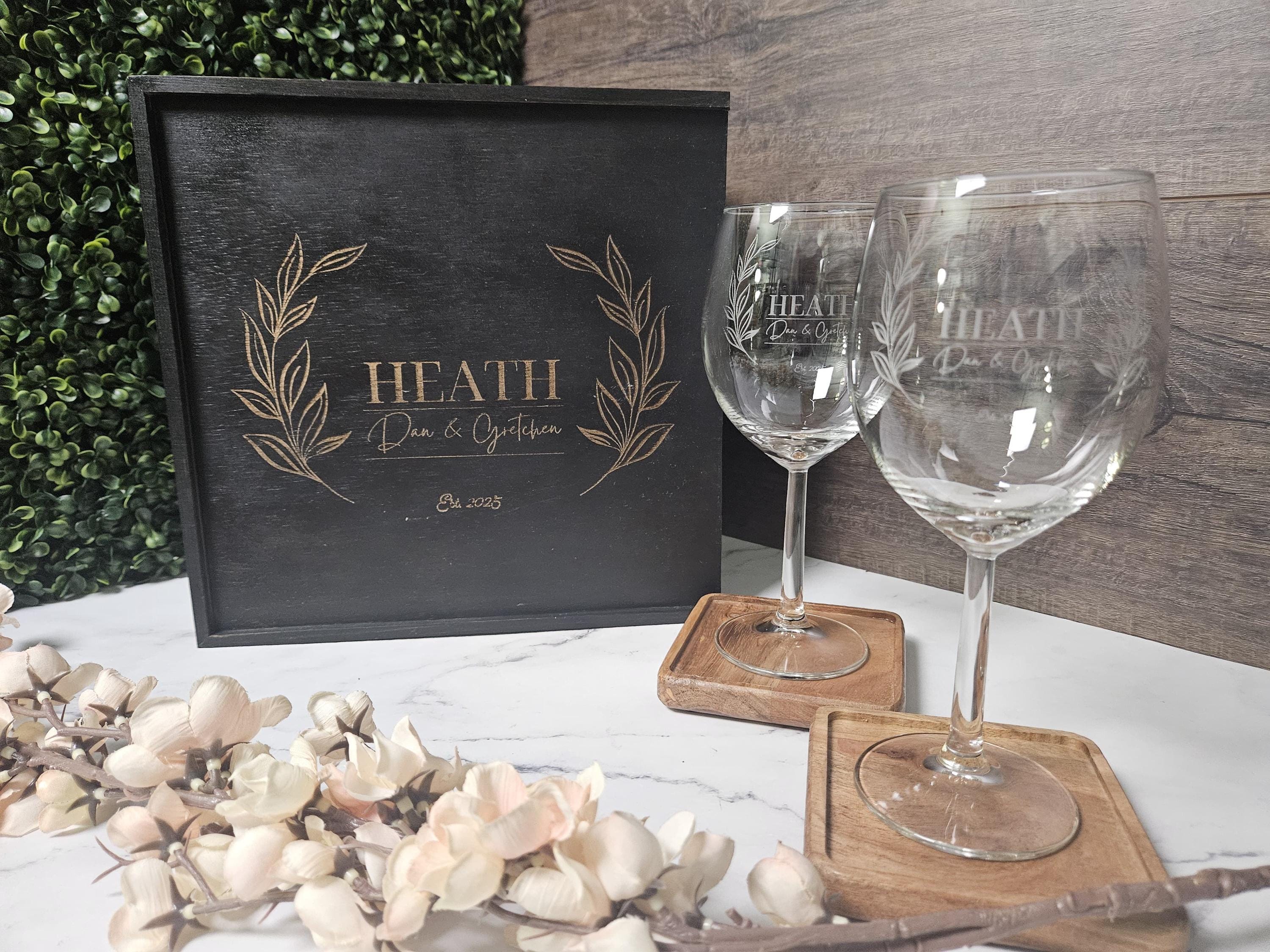 a couple of wine glasses sitting on top of a table